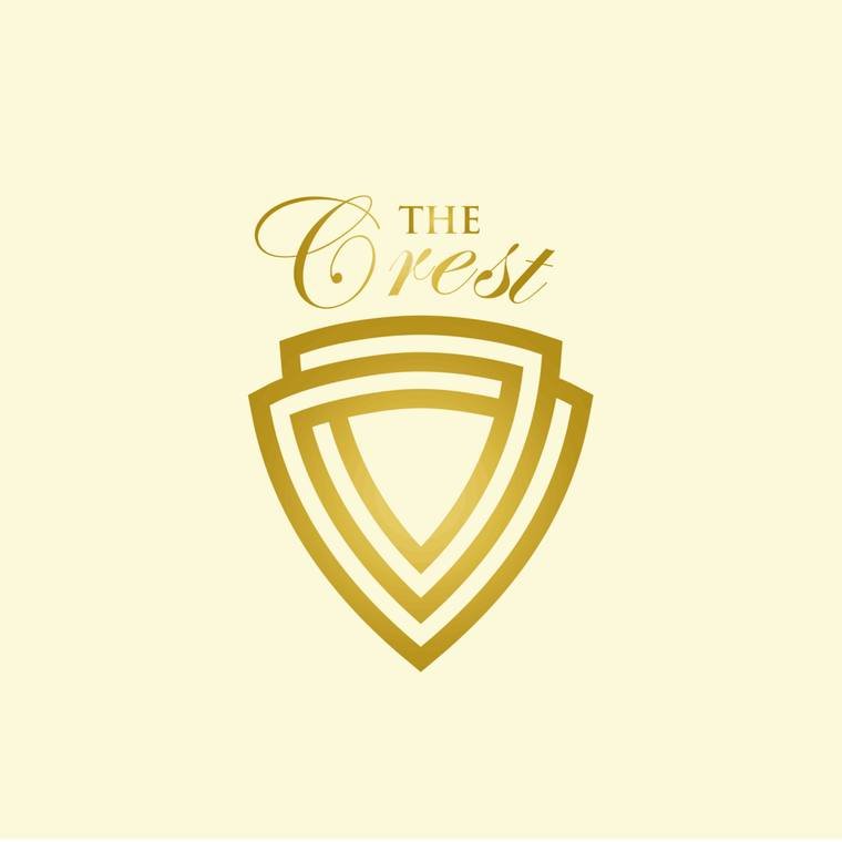 The Crest logo, a gold line shield mark, designed by Propix Jaipur