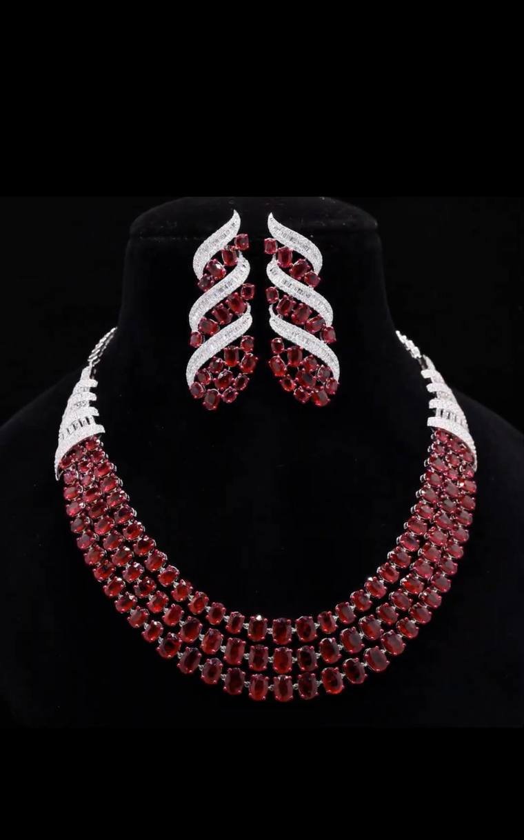 Ruby and diamond necklace on a display bust, jewellery product photography by Propix